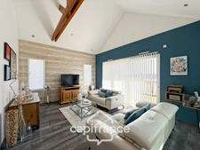 Maison contemporaine de plain-pied de 160 m² – 4 chambres – Véranda de 27 m² avec spa – Double garage – Carport – Noyal-Pontivy