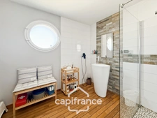 Maison contemporaine de plain-pied de 160 m² – 4 chambres – Véranda de 27 m² avec spa – Double garage – Carport – Noyal-Pontivy