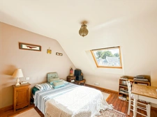 Spacieuse maison familiale en brique – 4 chambres, terrasse de 60 m² avec pergola – Proximité immédiate du centre de Noyal-Pontivy