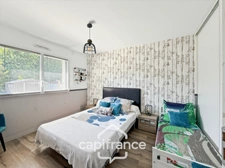 Maison contemporaine de plain-pied de 160 m² – 4 chambres – Véranda de 27 m² avec spa – Double garage – Carport – Noyal-Pontivy