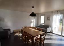 In the center of Montrevel-en-Bresse, a bright 2-bedroom apartment with balcony, top floor and garage – in a recent building 