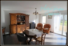 In the center of Montrevel-en-Bresse, a bright 2-bedroom apartment with balcony, top floor and garage – in a recent building 