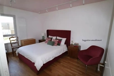 In the center of Montrevel-en-Bresse, a bright 2-bedroom apartment with balcony, top floor and garage – in a recent building 