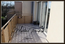 In the center of Montrevel-en-Bresse, a bright 2-bedroom apartment with balcony, top floor and garage – in a recent building 