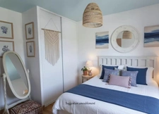 In the center of Montrevel-en-Bresse, a bright 2-bedroom apartment with balcony, top floor and garage – in a recent building 