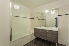 Appartement T4 récent avec terrasse, jardinet et parking en sous-sol