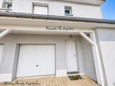 Immeuble de 3 appartements avec garages et jardins