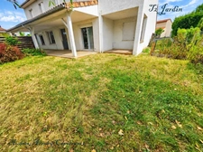 Immeuble de 3 appartements avec garages et jardins