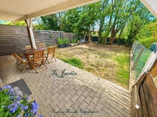 Immeuble de 3 appartements avec garages et jardins
