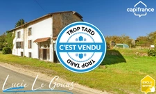 Maison de 250m² à rénover à Grand-Failly, avec jardin, grange et garage.