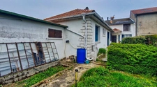 Ensemble immobilier de 220m² avec garage et jardin  