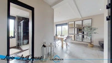 6-room apartment of 132m² with parking, garden, balcony and courtyard, and commercial premises