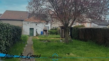 Ensemble immobilier de 220m² avec garage et jardin  