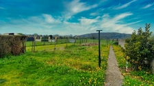 Ensemble immobilier de 220m² avec garage et jardin  