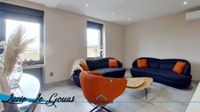 6-room apartment of 132m² with parking, garden, balcony and courtyard, and commercial premises