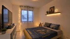 Single-storey 4-bedroom villa with garage and garden