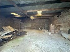 Local/garage d'une surface de 130 m², au centre de COURVILLE SUR EURE (28)
