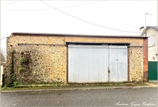 Local/garage d'une surface de 130 m², au centre de COURVILLE SUR EURE (28)