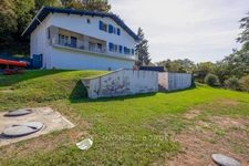 ENSEMBLE IMMOBILIER DE 309 M² – 3 APPARTEMENTS INDÉPENDANTS SUR 2 890 M² DE TERRAIN