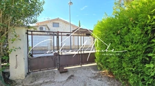 Maison à rénover de plain-pied de 67m² - 2 chambres - jardin et garage
