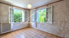 Maison à rénover de plain-pied de 67m² - 2 chambres - jardin et garage