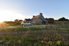 Maison à rénover avec grand terrain