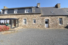 Maison en pierre avec grand terrain