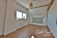 Renovated house of approximately 196 m² of living space, offering a main residence, an independent apartment and a multipurpose space.
